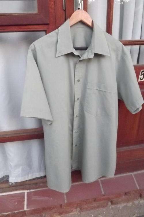 Light Olive green short sleeve men's shirt in poly cotton in size L.