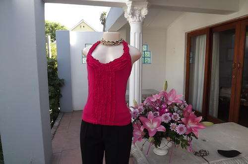Pretty pink halter neck top in stretch cotton.size 36/12.Never used