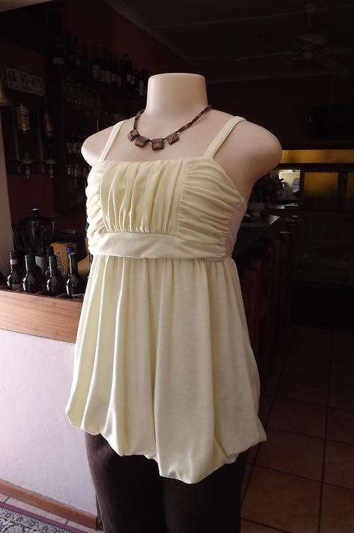 Sexy Vanilla colour strappy baloon style long top size 28-4 .Gathered bodice. As new condition.
