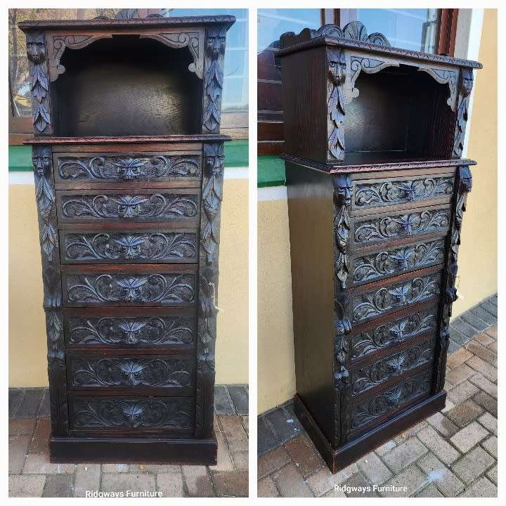 CARVED OAK JACOBEAN WELLINGTON CHEST