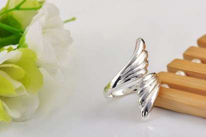 Ring of wings stamped 925