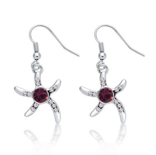 Dainty starfish ruby earrings. ...