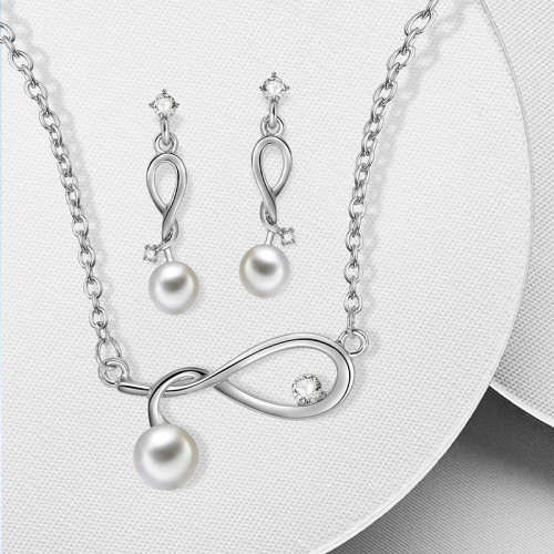 Stunning 3 piece silver and pearl plated set