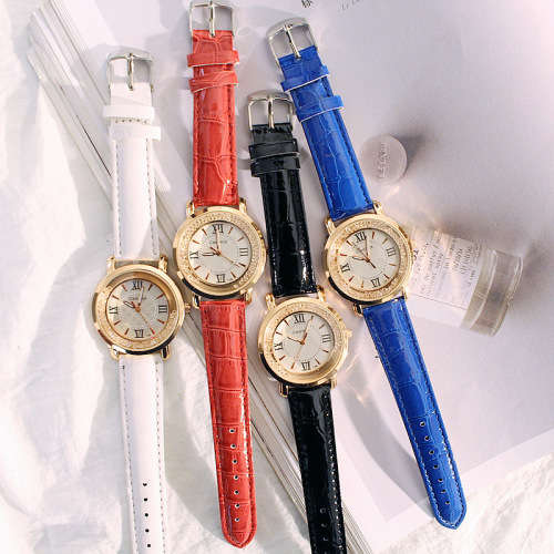 Inset Crystals quartz gold watch ..