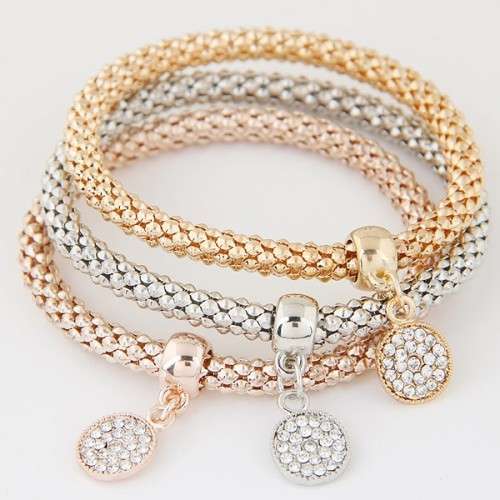 Three piece set bracelet.. gold, rose, white plated..
