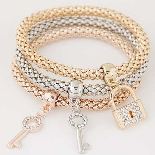 Three piece set bracelet.. gold, rose, white plated..