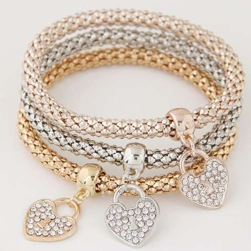 Three piece set bracelet.. gold, rose, white plated..