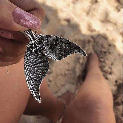 A mermaids tail pendant and free chain!!