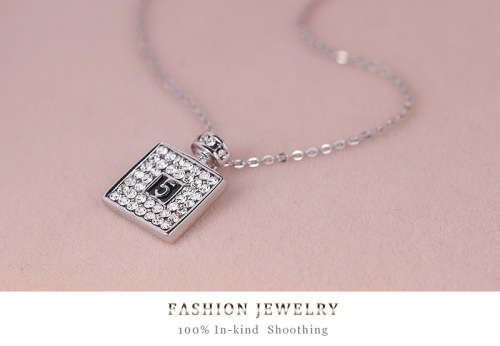 Chanel no.5 gold or silver filled pendant and free chain!!