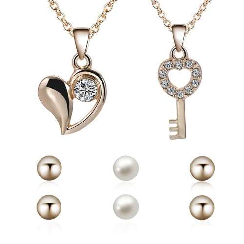 Captivating 5 piece jewelry set!! 2 pendants and 3 sets of earrings with 2 free chains!!