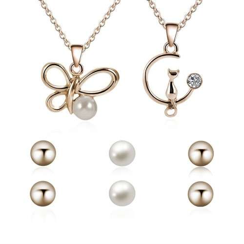 Captivating 5 piece jewelry set!! 2 pendants and 3 sets of earrings with 2 free chains!!