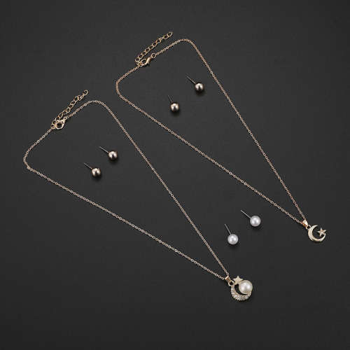 Captivating 5 piece jewelry set!! 2 pendants and 3 sets of earrings with 2 free chains!!