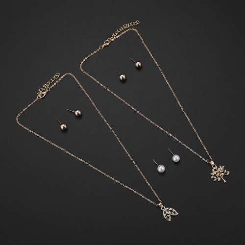 Captivating 5 piece jewelry set!! 2 pendants and 3 sets of earrings with 2 free chains!!