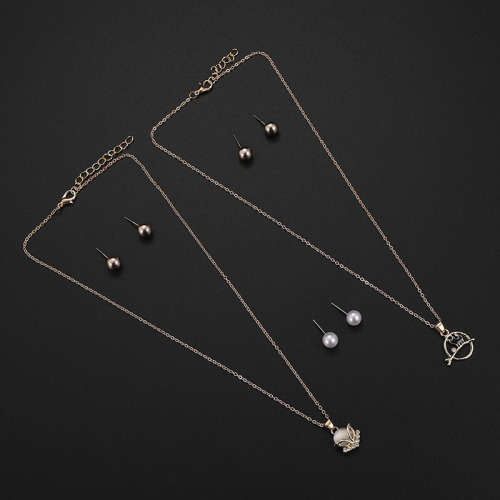 Captivating 5 piece jewelry set!! 2 pendants and 3 sets of earrings with 2 free chains!!