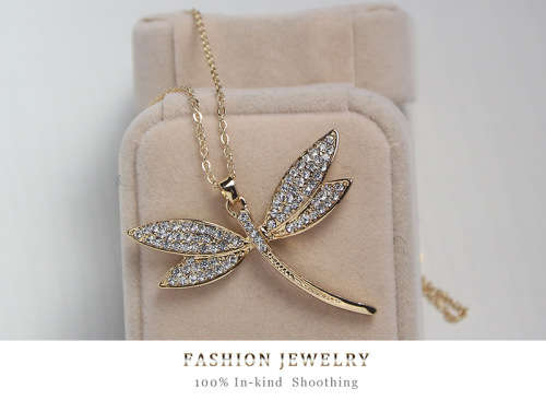 Gold dragonfly pendant with swarovski elements.. Free chain