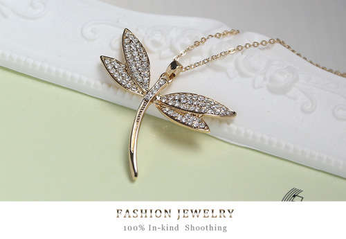 Gold dragonfly pendant with swarovski elements.. Free chain