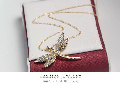Gold dragonfly pendant with swarovski elements.. Free chain