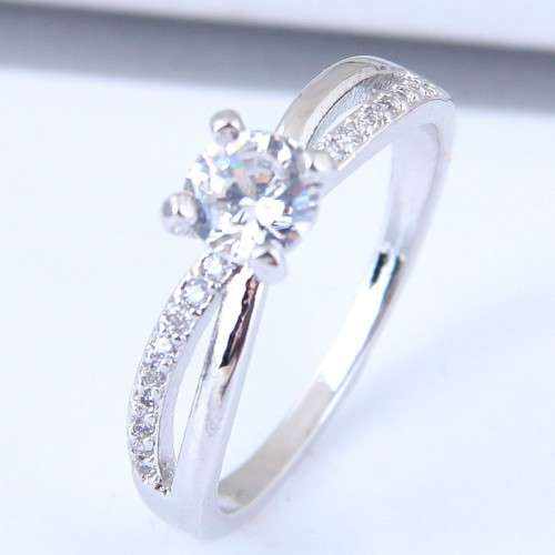Solitaire CZ wrapped in white gold filled setting..with swarovski elements