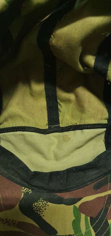 CAMO CAP . 55CM CIRCUMFERENCE.