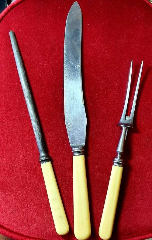 ANTIQUE  BONE HANDLE CARVING KNIFE, FORK & SHARPNER SET.CIRCA 1910 .BY APPOINTMENT OF KING GEORGE V.