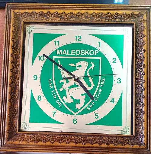 MALEOSKOP 1984. SAP TIN OPL / SAP COIN TRG.  WALL MOUNTED CLOCK. 30CM X 30CM .