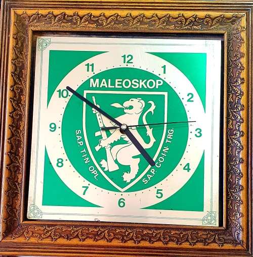 MALEOSKOP 1984. SAP TIN OPL / SAP COIN TRG.  WALL MOUNTED CLOCK. 30CM X 30CM .