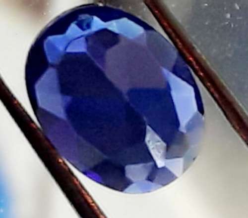 TANZANITE VIVID BLUE. OVAL CUSSION CUT. 1.20 CT. 6mm x 8mm .IDEAL FOR SETTING !!