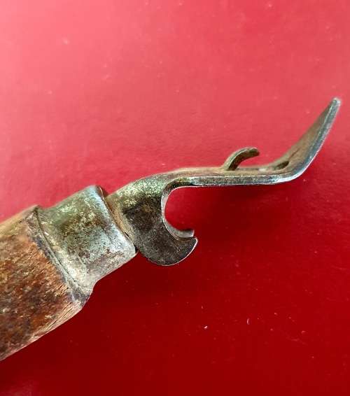 ANTIQUE BEER BOTTLE OPENER. CIRCA 1920S