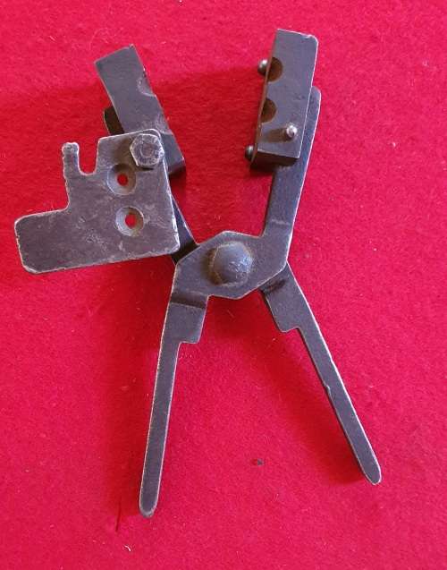 1940s  BULLET MOLD. 2 BULLETS . LOOKS LIKE 9MM.
