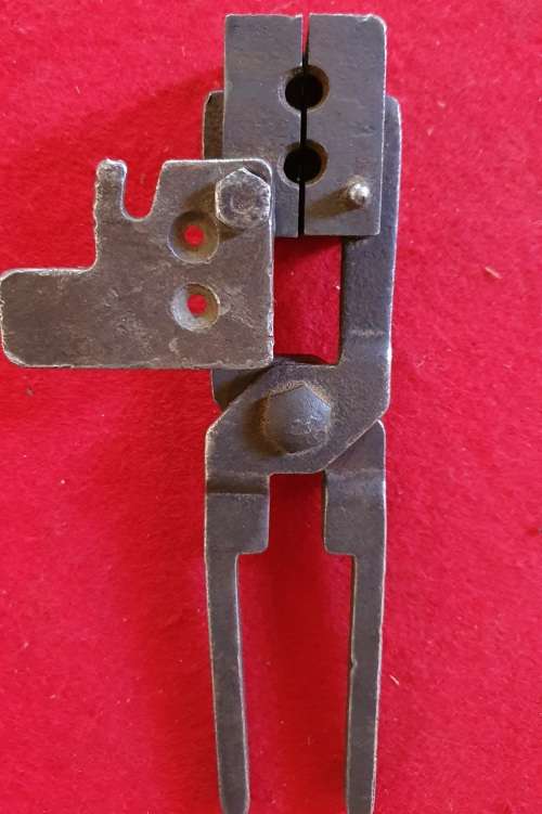 1940s  BULLET MOLD. 2 BULLETS . LOOKS LIKE 9MM.