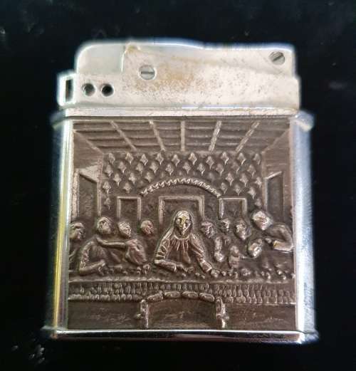 VINTAGE  LIGHTER WITH LAST SUPPER EMBOSSED