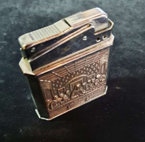 VINTAGE  LIGHTER WITH LAST SUPPER EMBOSSED