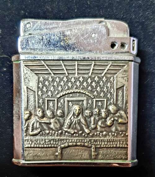 VINTAGE  LIGHTER WITH LAST SUPPER EMBOSSED