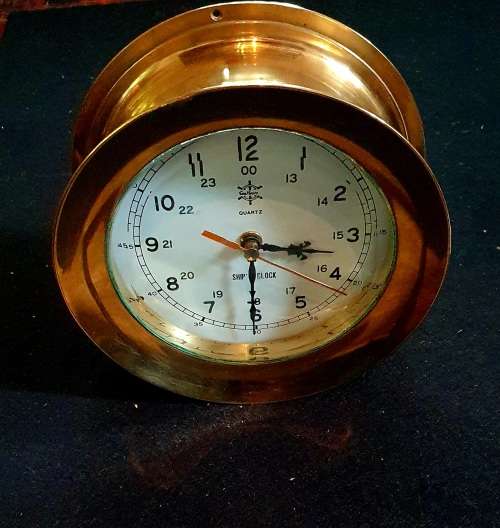 VINTAGE SHIPS CLOCK SOLID BRASS WITH THICK BEVELED GLASS. 2.8 KG.QUARTZ .SEA HOUSE.