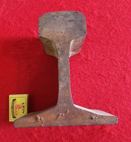 ANTIQUE TRAIN RAIL USED AS ANVIL . 18CM HIGH X 15CM WIDE ( FOOT) 8CM (RAIL)   X 12CM WIDE.