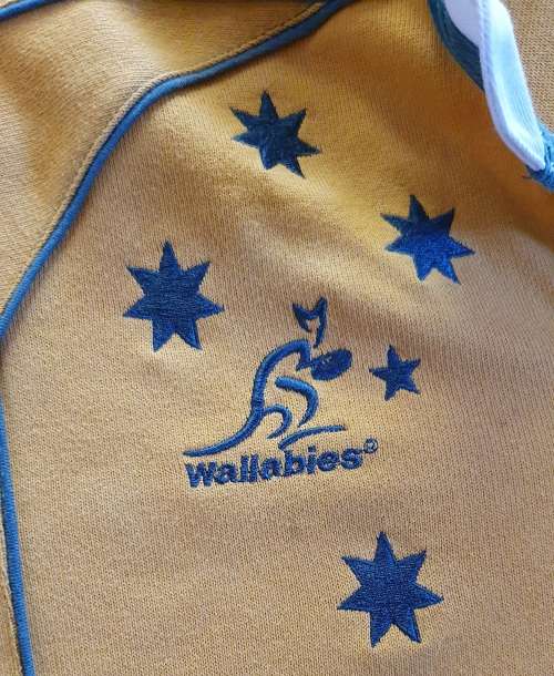AUTHENTIC WALLABIES TEAM REPLICA JERSEY. SIGNED BY JONAH LOMU. XL. 2000