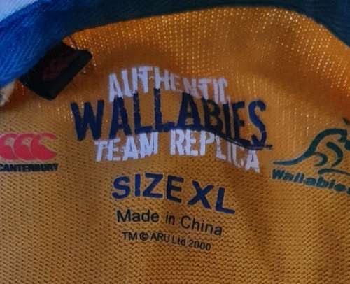 AUTHENTIC WALLABIES TEAM REPLICA JERSEY. SIGNED BY JONAH LOMU. XL. 2000
