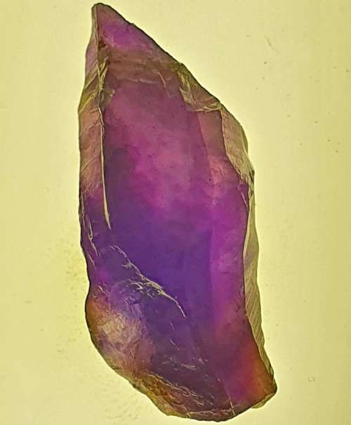 AMETHYST  RAW CRYSTAL. 8.4 GRAMS.  30 MM LONG X  55 MM CIRC.