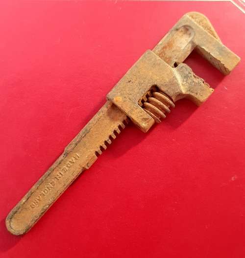 ANTIQUE MINIATURE MONKEY WRENCH.