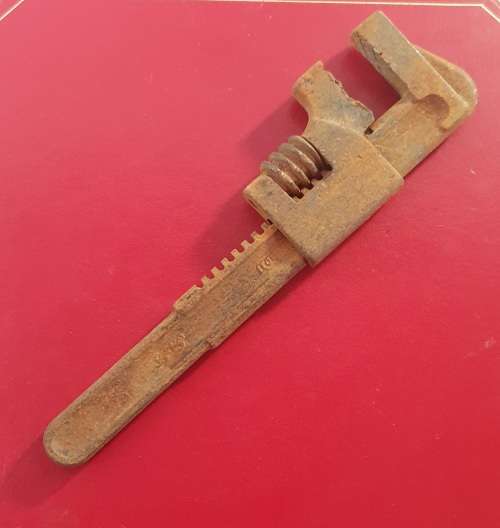 ANTIQUE MINIATURE MONKEY WRENCH.