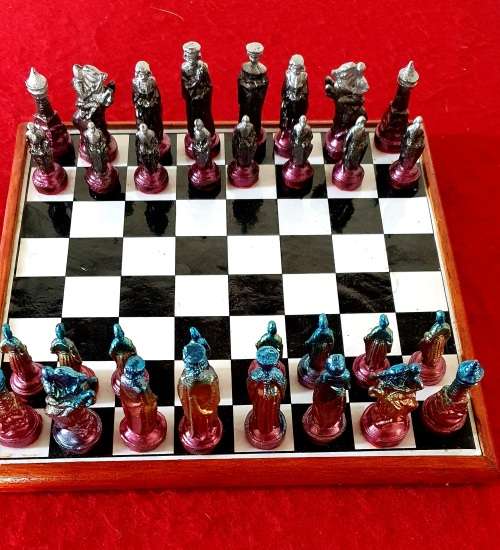 VINTAGE SOLID HEAVY LEAD CHESS PIECES ON CERAMIC BOARD CHESS SET.