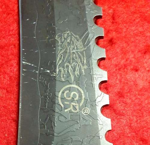 31CM  PATTERN EMBOSSED BLADE SAWTOOTH BACK TACTICAL KNIFE.
