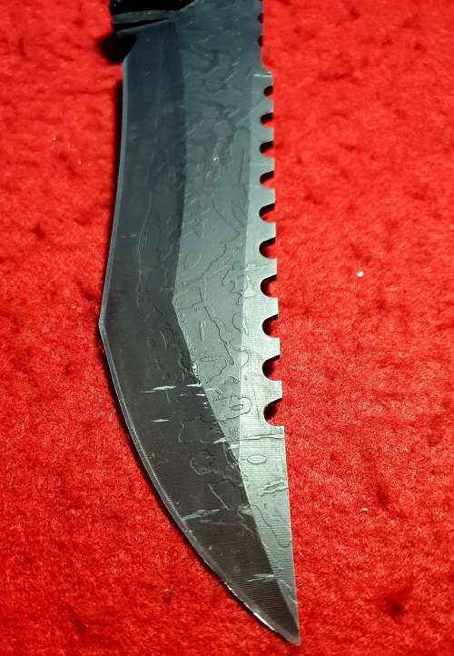 31CM  PATTERN EMBOSSED BLADE SAWTOOTH BACK TACTICAL KNIFE.