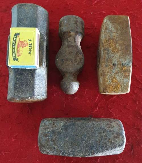 4 X  HUGE ANTIQUE BLACK SMITH FORGING HAMMER HEADS.