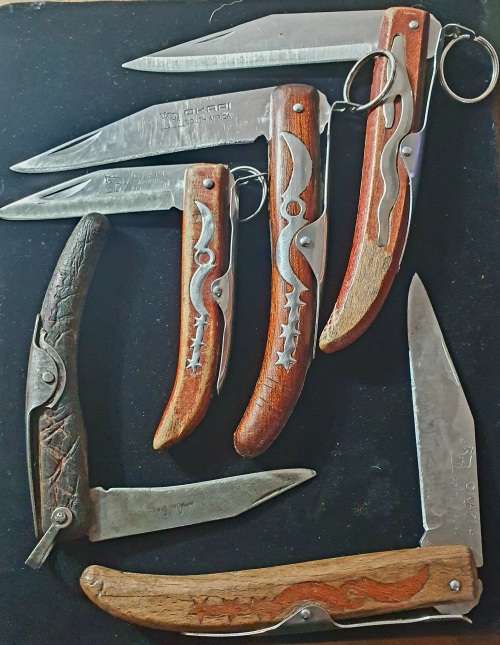 5 X VINTAGE TO ANTIQUE OKAPI FOLDING KNIFES. INCLUDING A CARBON STEEL ONE !! ALL WELL USED !!