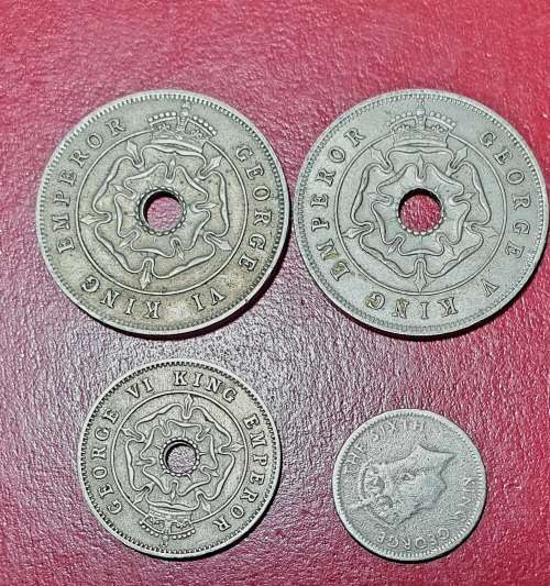 4 X SHOUTHERN RHODESIA COINS . 2 X ONE PENNY, 1 X HALF PENNY, 1 X 3D.