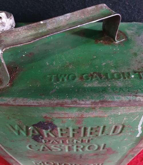 ANTIQUE EMBOSSED WAKEFIELD CASTROL MOTOR OIL 2 GALLON CAN.