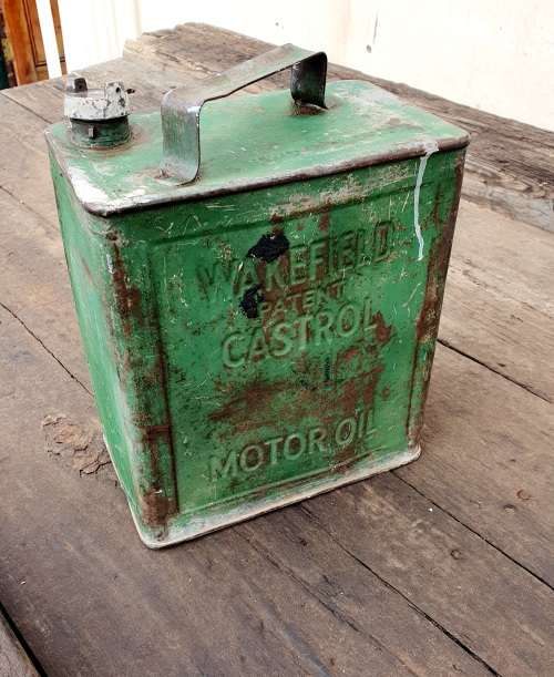 ANTIQUE EMBOSSED WAKEFIELD CASTROL MOTOR OIL 2 GALLON CAN.