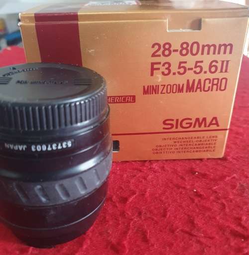 SIGMA 28-80mm F3.5-5.6 11 MINI ZOOM MACRO LENS IN BOX.