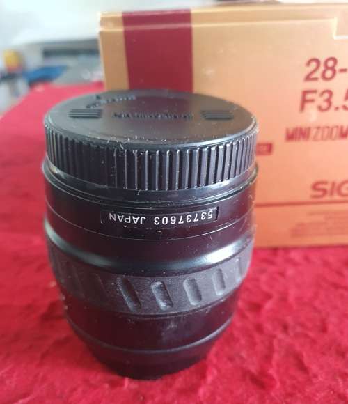 SIGMA 28-80mm F3.5-5.6 11 MINI ZOOM MACRO LENS IN BOX.